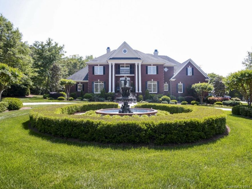 Induldge yourself in this private, gated home on over 10 acres. Home includes 2 story great room w/ Braizilian cherry hw flrs, a gourmet kitchen w/ viking 6 burner stove, double oven, microwave & trash compactor. Mstr suite w/ sitting room & custom hers/his closets. 5 br's up w/ bonus & outdoor veranda. Bar/entertainment room, outdoor terrace w/ fireplace & TV. In ground salt waterpool w pool house. Workshop/garage with lifts. A must see! also click on link below to see tour and floorplan