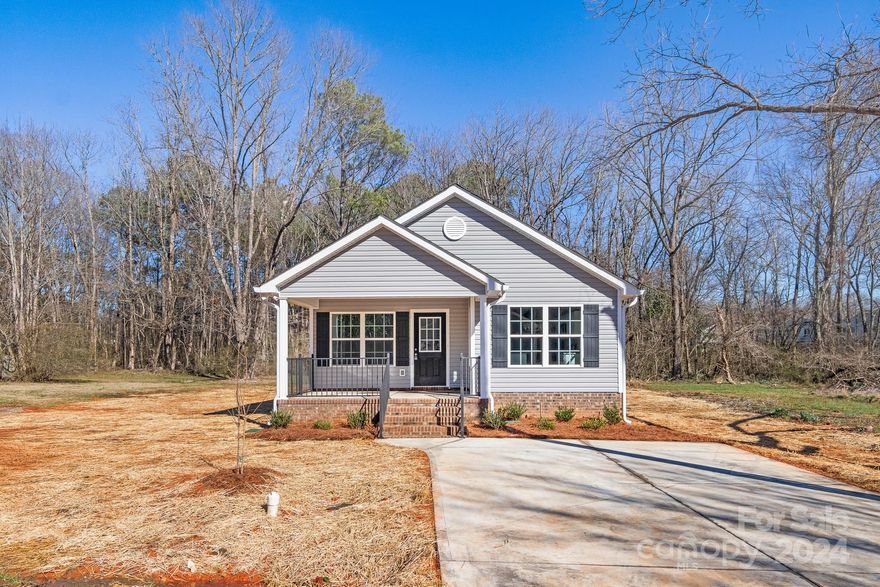 THIS HOUSE IS IN BEGINNING OF CONSTRUCTION- In Framing now! The Adkinson Narrow is a wonderful OPEN Floorplan home! This home should be completed by 07-31-2024. Walk-up to your covered front porch- a perfect place to start or end a day! Walk into Designer LVP Flooring throughout all areas of this home. Great Room is large & features a ceiling fan! The Dining Area is big enough for a table for 6 people! Kitchen is AWESOME with White Cabinets, Granite Countertops, NEW SS Appliances & Kitchen Island with Bar Seating! Kitchen also comes with a Refrigerator! 2 Guest suites are a great size. Guest bath features a double Granite Vanity with a Tub/Shower combo. Primary bedroom is large & features ceiling fan with HUGE walk-in closet. Primary Bath has a double vanity with walk-in shower.  Home comes with 1" Blinds throughout! **THIS IS AN ACTIVE CONSTRUCTION SITE-BE CAREFUL*