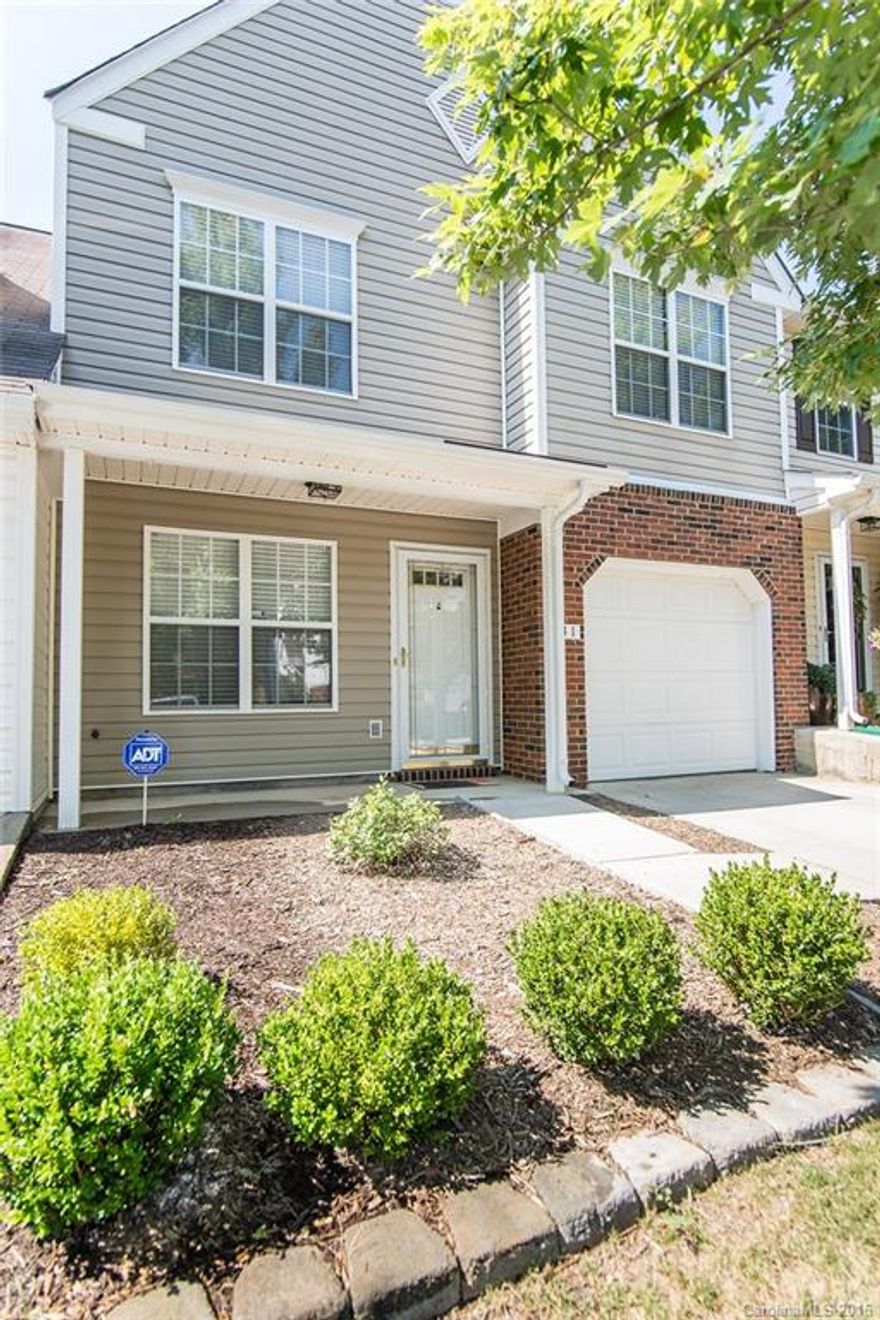 Flawless townhome located in close proximity to downtown Pineville. Close to dining, shopping, entertainment. Upgraded light fixtures, hardwood floors, granite counters, custom backsplash, under cabinet lighting, lots of cabinet storage in kitchen. Owner had custom bar installed between dining room and kitchen with pendant lights. Two story great room with floor to ceiling windows and gas log fireplace. Large bedrooms and a loft upstairs. Vaulted ceiling in master bdrm.Walking distance to pool.