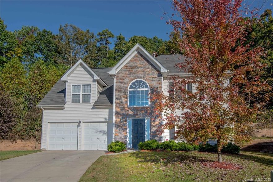 PRIME LOCATION at the top of the street and the base of the mountain!  Positioned on a cul-de-sac is a property with the extras...  fireplace in living area, picture moulding in the dining room, vaulted ceilings in all three bedrooms.  Privacy is abundant in the backyard at the base of Spencer Mountain.  Double garage and two story foyer.  Separate breakfast area. Owners suite features separate tub and shower.  Plenty of space and storage.  Zoned HVAC.  Priced right and move in ready!