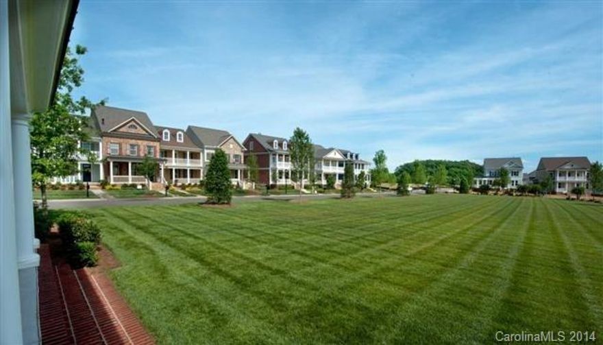 Charming double stacked wrap around front porches.  Formal dining room. 1st floor guest suite w/ full bath.Mud Room Drop Zone off garage. Gourmet kitchen w/large granite island & ss appliances. Kitchen opens to family and breakfast room.Owner’s suite includes tray ceiling & elegant owner's spa bath featuring dual sinks, tiled shower, walk-in closets, & garden tub.Bonus room, 3 bedrooms, & laundry on 2nd floor.Unfinished 3rd floor walk-up for future expansion.Homesite overlooks neighborhood lake!