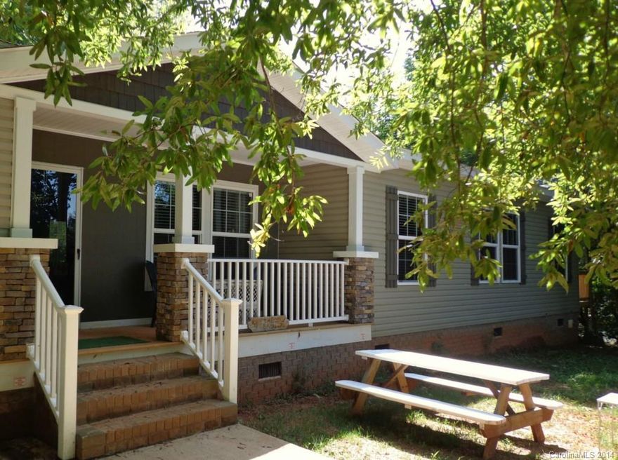 Welcome to McConnells SC,home of Historic Brattonsville just outside of Rock Hill. You’ve never seen a manufactured home like this before. Built November 2013 this upgraded beauty has it all;oversized kitchen with gorgeous cabinets, big island, beautiful stove and breakfast area! The great room features a monumental stone fireplace,upgraded baths with designer cabinets. All on 10 acres with 3 sheds and a 2 car carport.