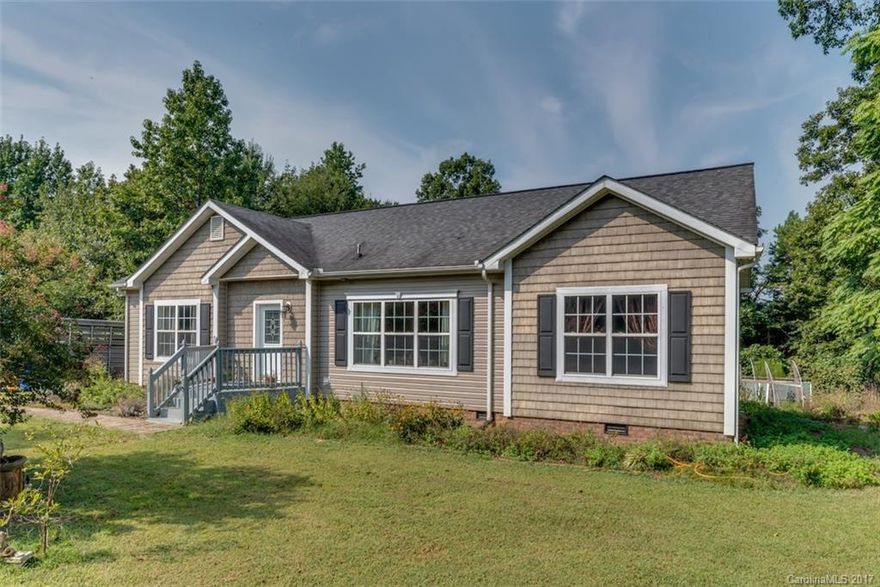 Rare Opportunity to find 10+ acres w/3 Established, Cross-fenced Pastures & 2 sheds + a Move-in-Ready Modular in Fantastic Condition located this close to town. Add 750+sqft of storage space in the attic  and a fenced rear yard perfect for pets or chickens and an amazing array of herbs and plants throughout the yard and you've got a one of a kind property! Upper Shed is Amish built w/water hydrant, 1 stall w/tack room. Lower barn - 2 runout style stalls, block tack room w/wash area for horses.