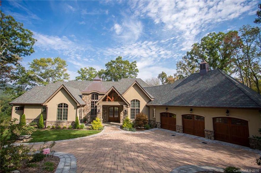 "Exquisite," in a word. 7700 square feet of thoughtfully designed and expertly crafted living space embraces you the moment you walk in. Each room flows effortlessly into the next as panoramic views flood into your home from nearly every direction. The outdoor living space on both levels calls to you all year long. Your new home boasts a long list of amenities: gourmet kitchen, multiple fireplaces, elevator, bar, wine cellar, abundant storage...Yet despite its size is comfortable and cozy. Rare.