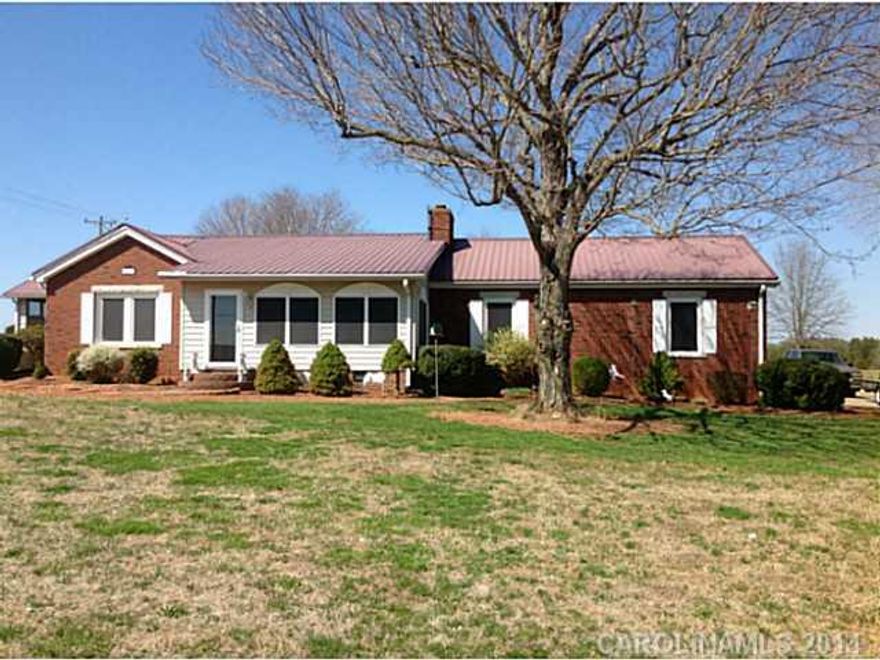 3 bed/2 bath brick ranch with full basement on over 3 acres with a country setting. Sunroom, formal dining room, large master suite with over-sized bath, walk-in closet, tub & separate shower. Outdoor built-in grill. Basement offers a 2nd fireplace and kitchen area, shower and storage. Detached workshop with 2 car garage. Sellers are leaving the refrigerator (new) and the washer and dryer.