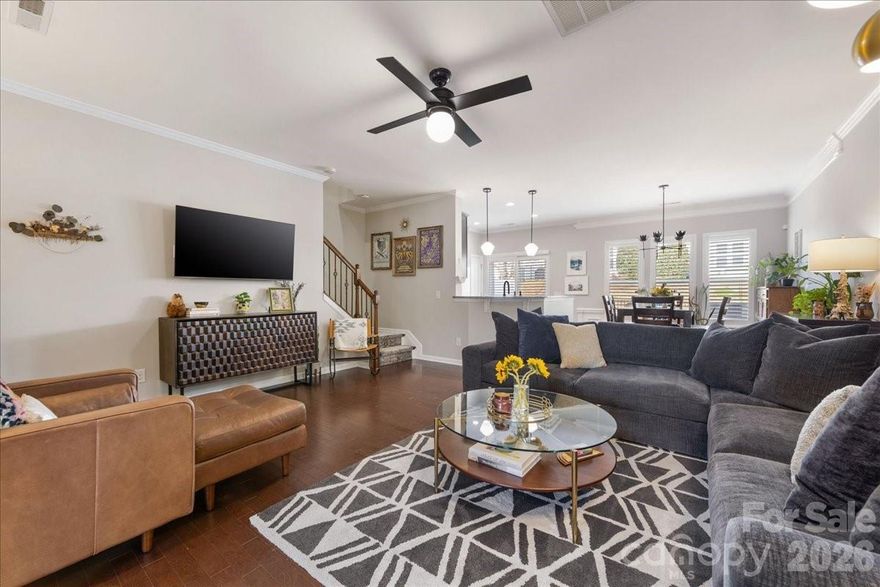 Beautiful townhouse in Park South Station that is one of the more private units in the community, featuring real hardwood floors throughout the entire home and a larger fenced-in backyard — something rarely found here. There is also private access to the greenway from the neighborhood! The home sits in a wonderful position within the neighborhood, with open green space both in front and behind, giving it a more peaceful and spacious feel than most townhomes. Inside, the layout is open and inviting, with the living room flowing seamlessly into the dining area and kitchen, making it perfect for entertaining or everyday living. A convenient hall bathroom on the main level is great for guests, and the home also includes a one-car garage with additional storage. Just off the main living space, the fenced-in backyard offers a great private outdoor area overlooking the community green space — ideal for relaxing, pets, or enjoying time outside. Upstairs you’ll find a large primary suite with a walk in closet and bathroom, two spacious guest bedrooms, a full guest bathroom, and a dedicated laundry room. The thoughtful layout and natural light throughout the home make it feel more like a single-family home than a typical townhouse. The current owners have completed numerous updates including new lighting, appliances, hardware, fresh paint, a stair runner, custom closet shelving, and many other thoughtful improvements you will appreciate when seeing the home in person. The location of Park South Station is truly unbeatable. The community offers fantastic amenities including a pool, playground, fitness center, sidewalks, dog runs, and beautiful common green spaces. It is also ideally located in the SouthPark area, just minutes from SouthPark Mall, the light rail for easy access throughout Charlotte, and the greenway for walking or biking along the scenic creek. This home truly offers the perfect combination of privacy, updates, community amenities, and an incredible location.