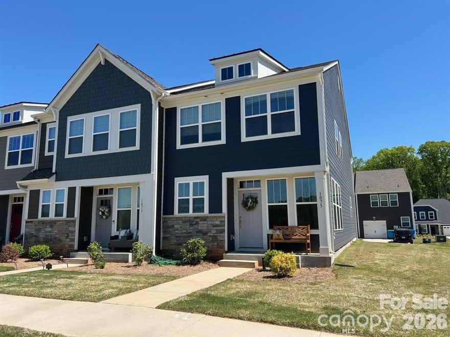 MOTIVATED SELLER OFFERING EITHER A 2-1 BUY DOWN TO REDUCE YOUR MORTGAGE FOR TWO YEARS OR $5,000 IN BUYER CONCESSIONS WITH ACCEPTABLE OFFER. This is your affordable opportunity to move to south Belmont! This end-unit town home on a corner lot shows like new and features an open floor plan filled with natural light through over-sized windows. Contemporary finishes include stainless steel appliances, granite counter-tops, pantry, tile back-splash, & modern view front door. The spacious eat-at island with built-in storage is ideal for both casual dining and entertaining. Durable LVP flooring throughout the main level for easy living. Attached garage for your convenience. Upstairs, the luxurious owner's suite boasts a walk-in closet and spa-like bath with dual vanities, and a walk-in tile shower with bench seating and upgraded glass enclosure. Two additional guest bedrooms provide generous space and ample storage for your family, friends, or a home office. Just minutes from Belmont's finest shopping, dining and entertainment experiences. Less than 15 minutes to Charlotte's airport. Easy commute to all the things you're looking for! This home gives modern living with a small town charm to deliver the best of both worlds.