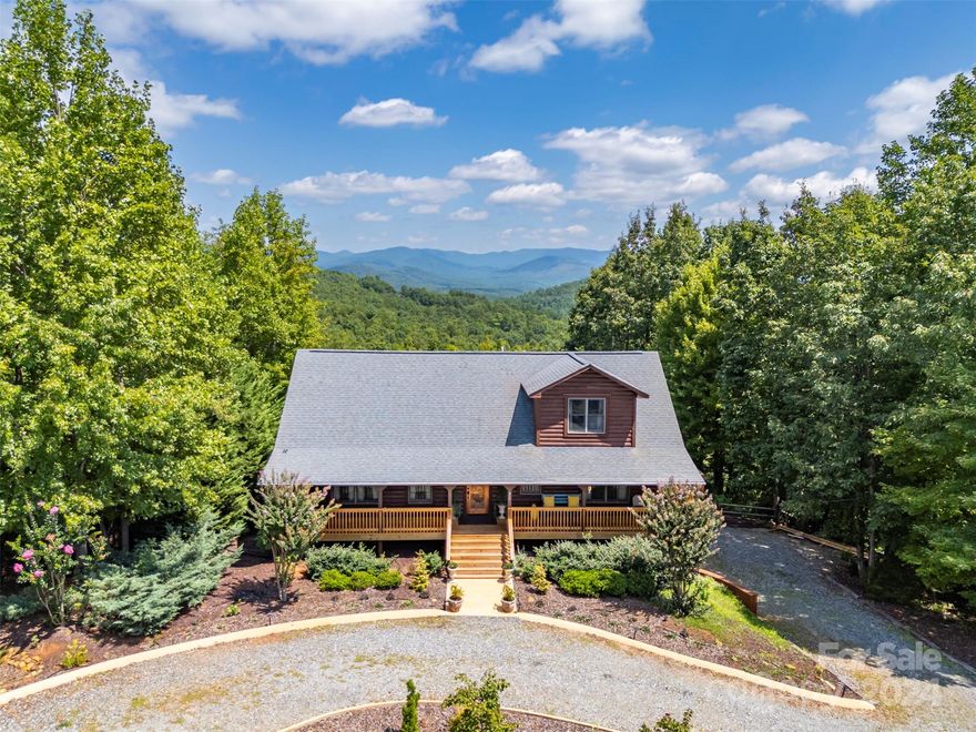 This Fully Furnished tri level log home in gated South Mountain Peaks is not to be missed! Tucked away in the foothills and only a 1.5-hour drive from Charlotte, Greenville, and Spartanburg, it provides a tranquil retreat with stunning mountain vistas. The expansive wrap-around deck is ideal for unwinding and enjoying the views.

The main floor is perfect for social gatherings, large or small. Separated from the living room the primary bedroom, has two closets and an en suite bath. The kitchen features a handsome cherry butcher block dining island, a farmhouse sink, spacious pantry and gas range. Above the living area there's a large loft with a computer niche. Starlink Internet is installed.

The finished basement has high ceilings, two bedrooms and a bonus room that's in use as a bedroom. The second living area opens to a concrete patio that's pre-wired for a hot tub installation. 

Up scale furniture is included. Yes to STRs!