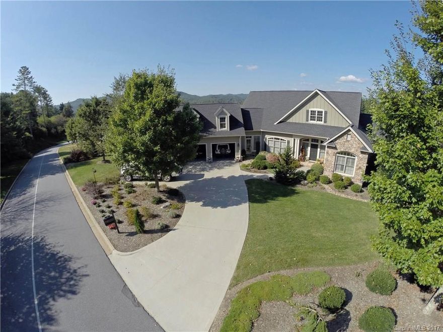Mtn.View, light & bright w/lots of glass, open floor plan, two stone FP, Glass/Screen room, traditional hardwood floors, plantation shutters, tile, crown, sep. furnace, air cond.& water heater for each level w/electronic air filters, Nat'l gas house generator, surround sound w/room controls, cedar closet, Dual HVAC, tinted windows, custom kitchen, granite counter tops, wine cooler, spice drawer, under cabinet, lighting, glass tile backsplash, Bosch DW, cherry cabinets, pantry w/pull-out shelves.