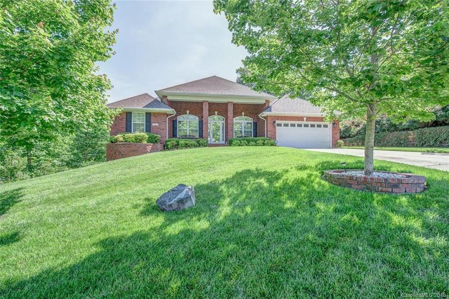 Location location location!  Move in ready! Full brick, open plan has hardwood floors throughout the main area. Split- four bedroom plan. Seasonal sunroom and large deck overlooking private wooded lot. 
Shows like new!! Be sure to see the virtual tour.