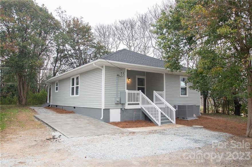 Remodeled 3 Bed 2 Bath Home! New Exterior Vinyl Siding, New Windows and Doors, New Gutters, Front and Rear Covered Porches, New Flooring Throughout, New Neutral Paint. New Light Fixtures. New White Kitchen Cabinetry w/ Granite Counters, Tile Backsplash, and Kitchen Island. New Stainless Steel Appliances, Large Open Floor Plan. Primary Bedroom Has Walk In Closet. New Tile Shower, toilet, and Vanity. New HVAC and Water Heater. Home is Move In Ready!