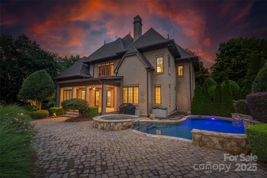 Elegant, home with Primary Bdrm Suite on Main Level, NEW UPDATES- Fall 2025, Lighting/Paint/Fans,  Open Floor plan with large rooms.  Large and elegant library/office with vaulted ceiling, custom, rich wood cabinetry with built-in lighting and a beautiful, peaceful view overlooking trees.  Entertainment center/mini kitchen w/full size refrigerator//bar,dishwasher/sink 2nd floor, Laundry #2 upstairs with stackable washer/dryer, flex room for exercise/hobbyist. Whole home audio w/4 zones. Surround Sound system for Home Theatre.  Architectural details throughout home. You will enjoy the soothing waterfall features of the Heated Salt Water Pool.  Adjoining pool is a spa hot tub.  Pool has night lighting and home has exterior landscape night lighting.  The veranda porch has 3 interior/exterior doors to the main floor of home, (primary bdrm, breakfast/kitchen area, and main living area).  Exterior includes a stone patio surround & walkways and exterior entrance to a half bath & back yard is fully fenced. Primary Bath. Half bath serves pool area with separate entry.  Nest Security Equipment. Architectural details throughout home. To add value to this home, Single garage door on basement level allow housing for extra watercraft/automobile storage, whole house water filtration system.  Equipment room upstairs off 2nd floor great room. Office/Library on 2nd floor converted from bdrm previously. 1468 sq.ft.basement  partially plumbed with/utility sink & partially wired and ready for you to create more living space such as a 2nd living qtrs./recreation space/or use for storage/automobiles.  Gun Safe and Outdoor Grill stay with home.