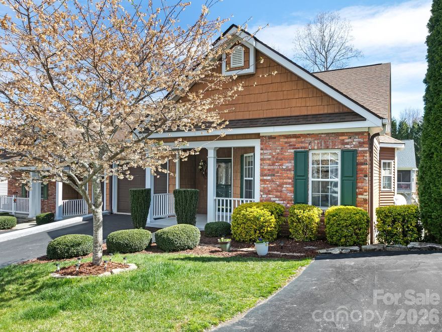 Four-bedroom, three-bath end-unit townhome with scenic creek views! Enjoy peaceful outdoor retreats on both upper and lower decks, ideal for morning coffee or evening relaxation. The open concept main level provides seamless flow from the kitchen to the dining area and living room, ideal for entertaining. The gas fireplace serves as a warm focal point. Main level primary suite features an en-suite bath with dual vanities, a soaking tub, and a separate walk-in shower. The second bedroom is ideal for guests, workspace or hobbies, with a full bath nearby. Laundry is on the main floor for ease of use. Spacious lower level provides additional living space with two generous bedrooms and a full bath. Nearly finished space is ideal for an artist studio, fitness area, or extra living/storage space. One-car garage with epoxy flooring and two additional parking spaces. Multiple gas utilities, including oven/range, water heater and fireplace. Peace of mind with whole-house generator, roof replaced within the last few years, radon mitigation system installed in 2022, encapsulated crawlspace with dehumidifier and 50-gallon water heater replaced in 2021. Convenient access to the Ecusta Trail from Daniel Drive and Highway 64, with outdoor recreation such as pickleball, tennis, swimming, golf, and shopping/dining at Laurel Park Village just moments away.