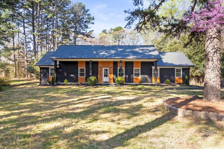 This stunning full-brick ranch has been completely renovated, offering both privacy and modern upgrades. Set back from the street, the home provides a large front and back yard with mature trees, creating a peaceful retreat. Inside, you'll find a brand-new kitchen with custom wood cabinets, soft-close drawers, quartz countertops, a waterfall island, and a subway tile backsplash. New stainless steel appliances complete this chef’s dream kitchen.

Every light fixture is unique, adding a custom touch. The distinct Gold ascent walls set this home apart. The bathrooms have been fully updated with tile showers, floors, new vanities, mirrors, and commodes. Major updates include a new HVAC unit, water heater, plumbing, and electrical. High-end LVP flooring and new two-panel interior doors add to its modern charm.

Large hard to find home with large lot (0.73 acres).  NO HOA. Previous buyer terminated after inspection.