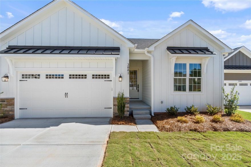 This spacious ranch-style home in a lovely 55+ community in Fort Mill, South Carolina, has a great view of the golf course driving range. It has an open floor plan with a gourmet kitchen, a large covered deck, a gas fireplace, and a finished basement with a rec room and a flex room. You can use the flexible space as a den, an office, or an exercise room. There’s a guest bedroom and laundry room on the main and a home office on the lower level along with a 4th guest bedroom and plenty of storage. The primary bedroom has its own bathroom, a walk-in closet, dual vanities, a raised toilet, and a spacious walk-in shower. This cul-de-sac home has everything! There’s a two-car garage with pull-down attic stairs. The yard is landscaped with a sprinkler system and lawn maintenance is covered by homeowners’ association dues. It’s close to downtown amenities, shopping, restaurants, a golf club, a community center, and Walter Elisha park. This is a great opportunity that you won’t want to miss!