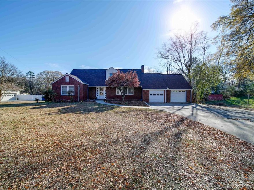 A large 1.28 acre lot in the city limits just down the street from the newly revitalized downtown Mt. Pleasant. Brand new roof replaced in September 2023 and comes with a lifetime transferable warranty. All interior walls with the exception of the kitchen have a fresh coach of paint. Floor boards and railing on the back deck will be replaced prior to closing.  Original wood flooring in most rooms and underneath the carpet. The basement is heated and cooled but the sunroom is not.  Large wired workshop perfect for hobbies or storage. Workshop is also plumbed for a sink but water has never been connected. Motivated seller will consider all reasonable offers. Seller paid closing costs or a flooring allowance will be considered with an acceptable offer. **UPDATE** The water heater has been replaced.