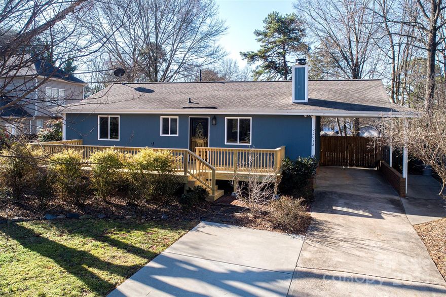 Rare find and completely updated 2 bedroom, one bath home, w/room to expand just steps away from Lake Norman in Bahia Bay. Could be your home away from home! Come inside to this open floorplan featuring a vaulted great room w/gas fireplace that is open to the dining room & kitchen; boasting open shelving, granite counters, SS appliances, & pantry with french doors. UPDATES: bedroom/bath/barn doors, fresh paint, gas logs, flooring throughout, tiled bath, appliances, light fixtures, cabinet hardware, deck, fencing, HVAC ('23), Roof ('17), extra parking & small watercraft storage & more. All within a 5-minute walk to the deeded/private community 1 acre lake access lot with a day dock, boat ramp, small watercraft ramp, and grills for only $75 in dues annually. Walk, bike, scooter or take a golf cart to shops - including Fresh Market, HomeSense, Ulta, Total Wine, Yoga, Orange Theory, Restaurants and more! Everything you could want is within 1-2 miles of the home with sidewalks & bike lanes.