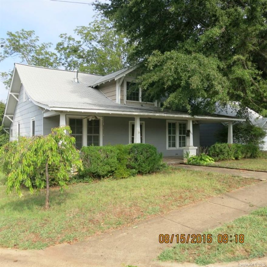 Discover century old charm of original wood floors, high ceilings, solid pine paneling.  Has been completely rewired & re plumbed.  The kitchen cabinets are new, but are reproductions of the originals.  The attic was renovated with new stairs (Careful, no hand rail!) and is almost complete with sheet rock, HVAC, & plumbing operative.  Just needs cabinets, trim & paint.  Includes adjoining lot.