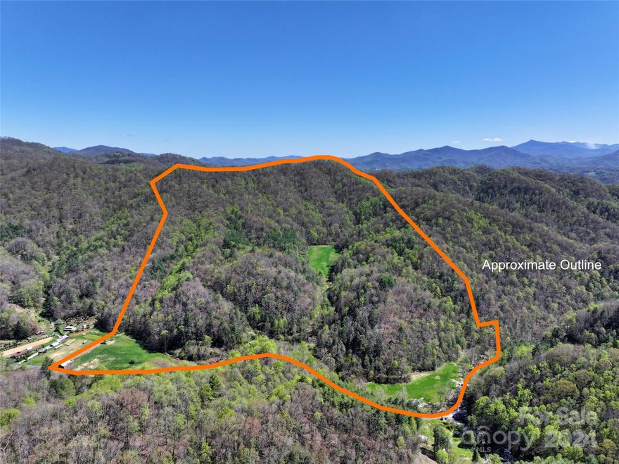 PRICE REDUCED, MOTIVATED SELLER!!  This UNRESTRICTED 138+/- acres has great mountain views, many trails for UTV, horses or hiking, a hidden meadow with big ridgeline views for your dream home or ecotourism business, a four season creek, a big spring-fed pond and two flat pastures, all on a quiet dead-end paved road accessing ~15,000 acres of Pisgah National Forest with many waterfalls. The old farmhouse boasts a stunning interior makeover and a huge new deck overlooking Pigeon Roost Creek. Bring your dogs and ATVs and explore the many interior trails on this unspoiled mountain gem. Pasture your horses in lush flat pastures with old apple trees! Enjoy morning coffee on your deck, serenaded by a cheerful four season creek. Marvel at the fireflies and countless stars in the dark night sky. Only 20 min to Burnsville and 60 min to Asheville for restaurants, shops and groceries. Own ~1700 feet of frontage on pristine Pigeon Roost Creek. Possible owner finance with substantial cash up front!