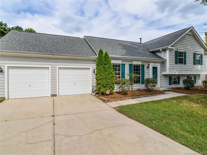 Picturesque 4BR/3BA home situated on a quiet cul-de-sac!  The split-level plan will WOW from the moment you enter.  The open concept greatroom/kitchen is perfect for entertaining.  Nicely appointed bedrooms.  Lower bedroom would make a great office/playroom.  Newer roof, HVAC, & hot water heater.  Open the the sliding door to relax on the new deck, enjoy the quarter acre lot & watch horses graze in the neighboring pasture!  Roast marshmallows over the fire pit!  This is a must see!