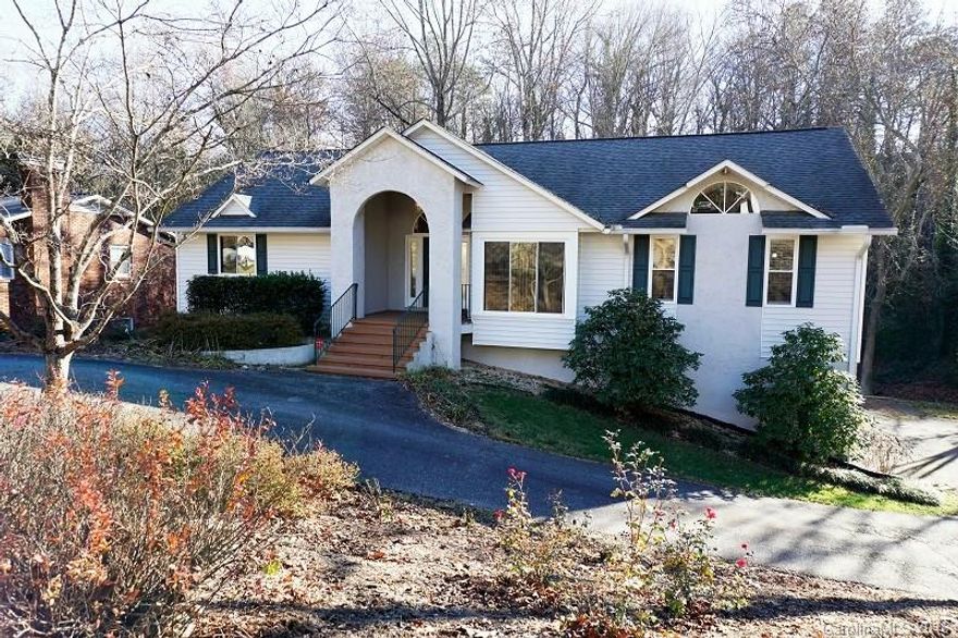 New kitchen added 2008 w/custom cabinets, stainless appliances including a gas cook-top with electric oven. Seated bar, tile back splash, under mount lighting, desk area, window seat, & pantry. Kitchen is set up to have sitting area. Hardwood floors, updated light fixtures, updated cabinets in both baths. Split bedroom plan. Grand ceiling throughout -even the bedrooms. Master bedroom with arched window & private bath features a solid surface walk-in shower, 2 separate vanities, & his/her closets