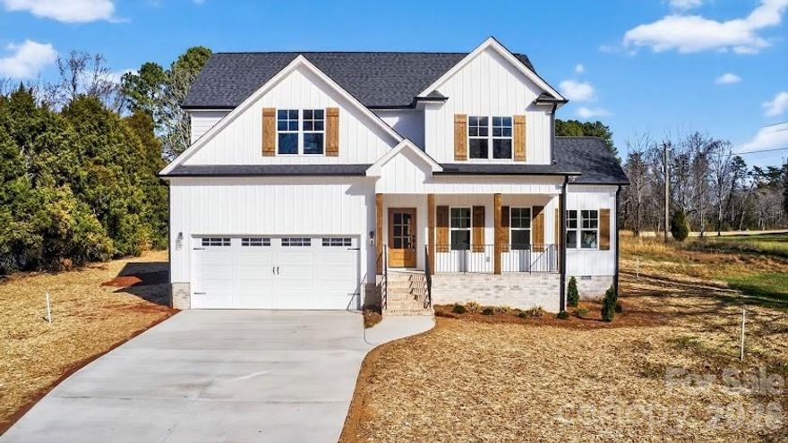 What an opportunity. Beautiful new construction set in the serenity of Deep Springs Country Club! Built by the Triad’s own, Dogwood Homes, this beautiful home blends elegance with backyard views of the Ellis Maples designed championship golf course. The main living space's oversized windows welcome abundant natural light. The kitchen is well suited for entertaining and loaded with ample cabinetry and countertop space. Sip coffee from the covered porch and look on to the 8th hole par 5 fairway's approach to the green. The main level, primary bed and ensuite bath has 2 separate vanities, walk-in shower, toilet room, and huge walk-in closet! Upstairs boasts a large bonus room that could also serve as office space. Close to the Dan River, Madison and Mayodan, and Belews Lake, 303 Country Club Drive offers countryside living, yet easy access into Greensboro and the surrounding Triad. Give us a call for a private tour!