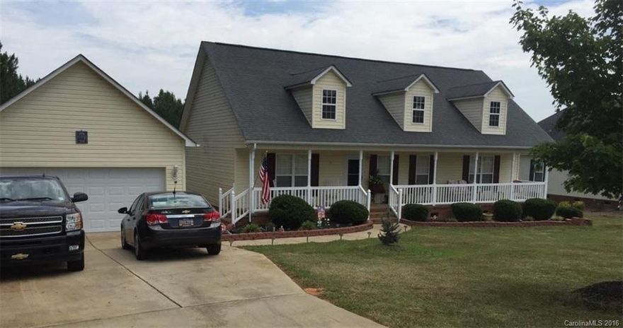 Ranch with 1.6 acres, split bedroom plan, detached garage, overhang in rear of garage for additional space, trey ceiling in master, double sinks, rocking chair front porch, plenty of space for a garden , outside storage bldg,  2 car garage, you will love living in this quiet peaceful setting