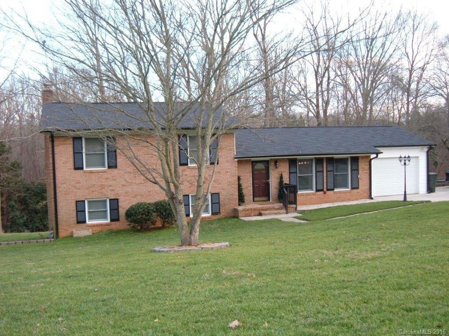 Well maintained Multi-Level living in established neighborhood w/mature trees. This 4BR home features 4 FULL Baths with tile floors.  HW floors in most rooms. 1 car garage. Newer kitchen, dining, study, and huge basement suite remodeled in 2010. Huge great room with gas log fireplace and wet bar.  Screened porch and patio overlooking a huge back yard. This home sits on .92 acres and full brick home.  Seller to provide one year home warranty for new buyer.  Close to shopping & restaurants.