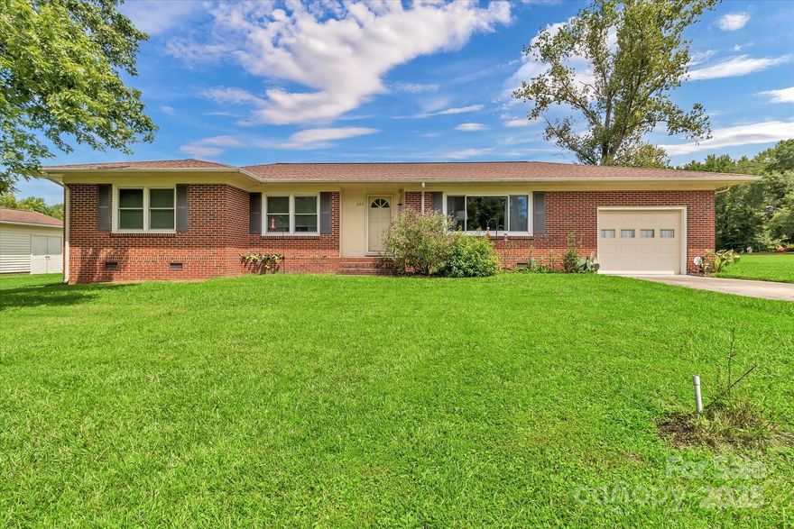 Escape to your own private retreat with this charming 3-bedroom, 2-bath home situated on 5.7 acres of serene countryside. The inviting layout features an updated kitchen with newer appliances, perfect for cooking and entertaining. Step outside to a spacious fenced backyard, complete with an above-ground pool for summer fun. A 1-car attached garage offers convenience, while the 1-car detached garage and workshop provide plenty of space for projects, storage, or hobbies. With ample land to roam and room for future possibilities, this property blends comfort, functionality, and peaceful rural living—while keeping you just a short drive from town.