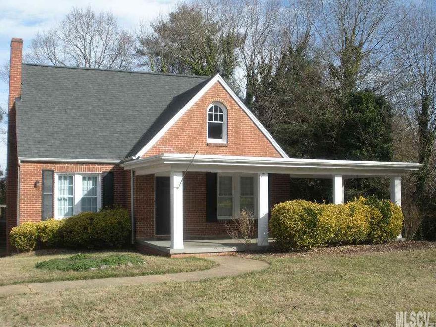 So much character & charm in this classic 4 bedroom, 2.5 bath, brick home in the heart of popular Viewmont on dead end street with no through traffic. Enjoy relaxing on the shady front porch & walk to restaurants & shopping. Lovely hardwoods throughout, nooks & crannies for storage everywhere. Extremely large kitchen with island, wood stove, & informal dining/den area with room for everyone. New tile floor & backsplash! New half bath on main level along with another full bath & two bedrooms. Upstairs offers two additional bedrooms, a full bath & bonus room. Private back deck & fenced area for pets. All appliances remain including washer & dryer. One year home warranty covering plumbing, electrical & HVAC already purchased for the new buyer! Cozy home perfect for entertaining!