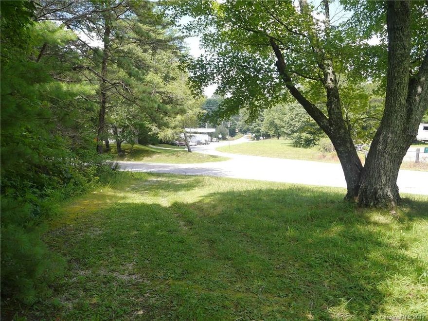 Existing gravel driveway to the the cleared, old homesite make this 10 +/- acre property easy to beginning using.  Existing block garage needs updates, but would make a great  workshop (no value assigned).  Great rural location less than 10 minutes to I-26 and Wal-Mart. Many suitable uses for this property, including residential and commercial.  This listing is a portion of a larger parcel, so tax value and tax bill TBD after closing.