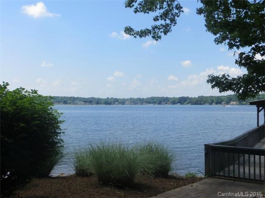 Pure Lake Norman Waterfront,Main channel,Endless Sunset views, Private,no homes on left,wooded,Professionally landscaped,Koi pond, large screened -in porch overlooking huge lake views,private sandy beach, huge walk out lower level , theater screen and projector included, master on main,large laundry, tons of storage,South of HWY150 Bridge. Country living ,easy to Mooresville or HWY 16, Flat lot,NO HOA, Double boat slips with boat lift, great neighborhood near the new Villages of Sherrills Ford