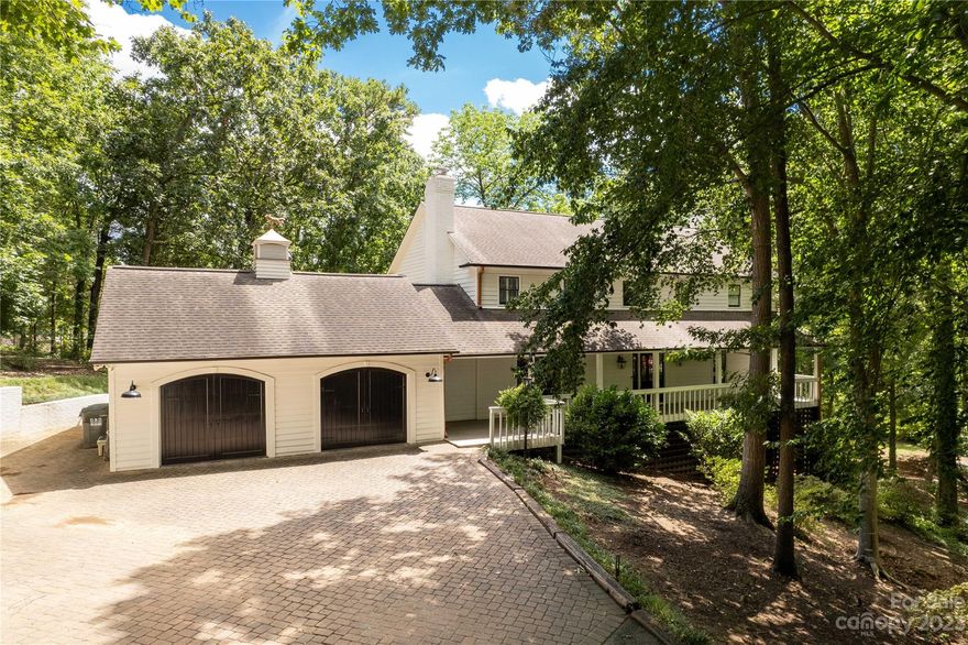 Nothing like looking at water from your own home! Charming home, nestled on almost an acre of beautiful landscape. Sit on the front porch and watch the golfers, sit on the back porch and watch the water. We love this traditional style home's modern twist with a functional layout and tons of room to roam! Do not miss the impressive tinker lovers dream garage with workshop, the over sized rooms upstairs that share access out to another stunning deck with views of the lake! Our favorite part of this home is the floating dock that is perfect for fishing or launching your kayaks. Roasting marshmallows down at the fire pit and looking strait up the cove will surely be your favorite weekend activity. This is an amenity rich community with a private beach for residents, 2 playgrounds, community dog park and garden and a golf and country club as well as a community marina! Located in the award winning school district and close to the airport and downtown, you want for nothing in this paradise!