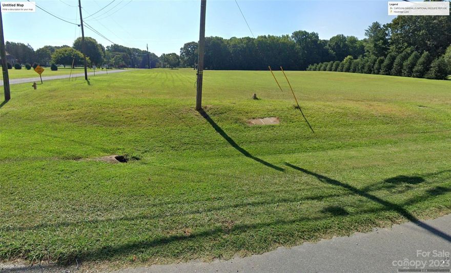 Incredible opportunity to own a large parcel of land in Mint Hill. Property is located in established quiet neighborhood along Hoodridge Lane (no current outlet).  Close to shops and restaurants in Mint Hill.
A portion of the property has large mature hardwoods which attract deer and other wildlife.  Approximately 4 acres is open which could be subdivided or possibly used for horse pasture.  Current zoning allows you to have horses or subdivide the entire property into 8 lots (additional work will need to be completed by a licensed engineer).
There is an existing 1400 sf brick ranch on property built in 1964 which is occupied and in good condition. HVAC replaced in 2012 and roof replaced 2008 with 25-year shingles.  Char-Meck public schools assigned are Bain Elementary, Mint Hill Middle School and Independence High School.  Queens Grant charter school (K-8) is very close to Hoodridge Lane.  Queens Grant High School is a short drive on Idlewild Road. House is being sold at no value.