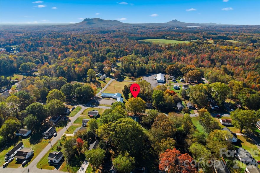 Discover this charming and versatile home just minutes from downtown Bessemer City. Perfect for single-family living or multi-generational arrangements, this property features two fully equipped living spaces, each with its own kitchen, bedroom, and bathroom, making hosting guests or extended family effortless. It can also easily be converted back to a three-bedroom home. A detached 16x20 garage and an additional outbuilding provide plenty of room for storage, a workshop, or creative projects. Enjoy the convenience of nearby shops, local dining, Crowders Mountain State Park, and wineries, with quick access to I-85 and U.S. 74 for an easy commute. Seller motivated, this home offers flexibility, comfort, and an ideal location, making it a must-see property.