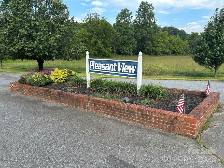 Reasonably priced building lot in the small, private community of Pleasant View. Nice buildable 2.03 acre wooded lot w/gentle slope. Conveniently located to Rutherfordton, Lake Lure & Chimney Rock. Great place & location to build your new home! Well worth your consideration.
