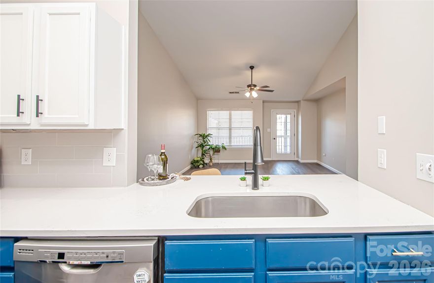 Move-in ready 2nd floor CONDO in UNIVERSITY AREA and by I-85 exits with stylish 2022 updates and recent 2026 refreshes, offering low-maintenance living and modern finishes throughout. INTERIOR:
• LVP flooring throughout
• Fresh Neutral interior paint; Jan 2026
• No popcorn ceilings
• Black lever door hardware
• 2" blinds
**KITCHEN:
• Two-toned, updated cabinets
• Quartz countertops
• Light Gray Subway tile backsplash
• SS appliance package (yes Fridge (AS-IS) included)
• Farmhouse sink with lighted faucet
• Breakfast bar; large closet that can be used as pantry
** LIVING/DINING AREA:
• Open-concept layout
• Vaulted ceiling
• Ceiling fan.** BEDROOMS/BATHS:  
• Owner suite w/ tray ceiling and 
Walk-in closet w/ attic access
• both Updated bath cabinets w/ quartz vanities
• Garden tub in owners suite
• Ceiling fans with lights
• Updated bathroom mirror, lamp fixtures & finishes
.**EXTERIOR:
• Private balcony; 
• Power washed drive, walk & siding (Jan 2026)
.**GARAGE AND SYSTEMS:
• Attached garage with oversized light
• HVAC replaced 2022 +
A thoughtfully updated home offering modern comfort, recent improvements—ready for its next owner. 1/15