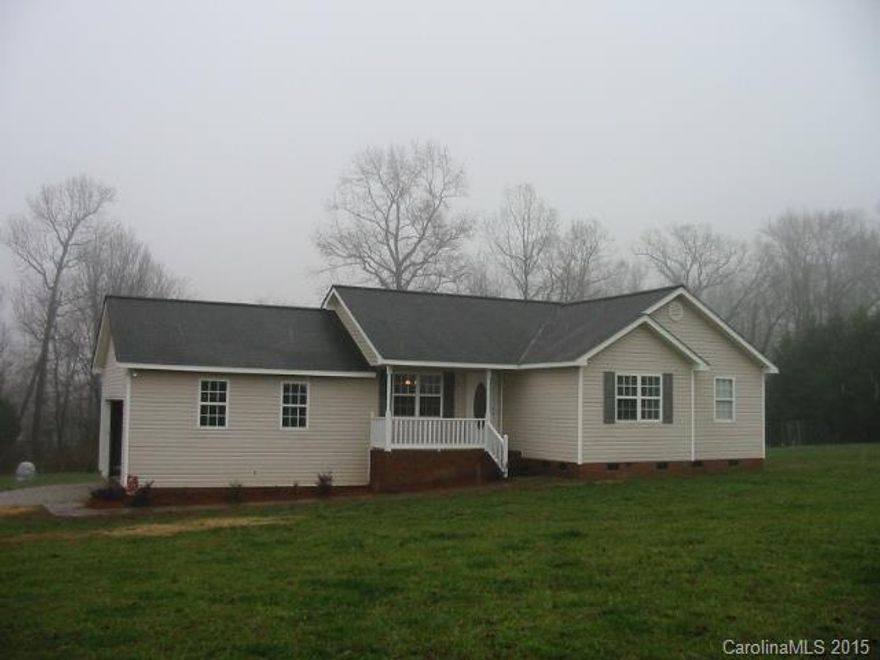 Cozy Ranch Home vaulted ceiling Great room and  fresh paint throughout while setting on 2.60 acres. This home features 3 bedrooms and two full baths and Master bedroom with tray ceiling. There is a side load 2 car garage with opener, covered front porch, rear deck and Huge 30'X40' workshop.