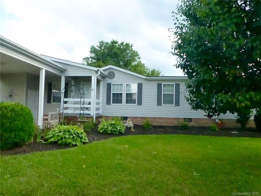 WOW! See enhancements list! This is the one, is what you will say when you enter this sparkling home in popular Riverwind!  Open, vaulted great room, beautiful spacious kitchen, the whole house is light & bright. You will love the 3 season rm & x-tra large screened in porch that looks out over lovely yard. Walls are dry wall, popular split bedrm plan,gleaming laminate flooring, 3 yr old architectural roof, beautiful x-tra large walk-in shower just to name a few of the features here!