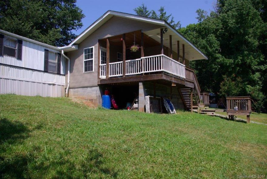 Looking for a starter home or perhaps an investment property?  This single wide home offers 3 nice sized bedrooms & 2 full baths.  3rd bedroom was added in 2006.  Covered deck on back.  Large detached storage building is 16x20 and has 2nd story.  Building is wired and has heat pump.