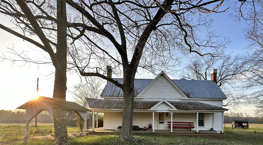 Welcome to the fast growing quaint City of Locust, only minutes from shopping, restaurants, local brewery and Rocky River Vineyards and Winery near The Reed Gold Mine. Escape to the country away from daily chaos on this property situated on over 20 acres of serenity. Room for livestock with sheds and a ready made chicken house. Take in the breathless sunrises and sunsets on this gorgeous property with a 120+ year old farmhouse which offers nostalgic character and much potential. The land has a flowing topography with approximately 60% pasture and the rest wooded area and home site. The property slightly slopes to a stream at the north end that is a flood fringe area in the far corner. The seller makes no representation on the condition of the house and sold As-Is (long term tenant). County Water is available at Austin Road.