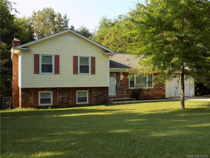 Beautifully updated home w/convenience to stores, restaurants, hwy, shopping! This home has 3 bdrms, 2 bths & office/flex space. Kit is updated with SS app, gas range, granite counters and refridg to convey. Fabulous mudroom with built-in storage space. Bright open living rm on main flr w/recessed lighting. Cozy family rm on lower level w/over sized brick fp w/gas logs. Private, open backyd lined w/trees & access to Greenway w/walking/jogging trails. New roof 2015, newer windows, new paint 2017.