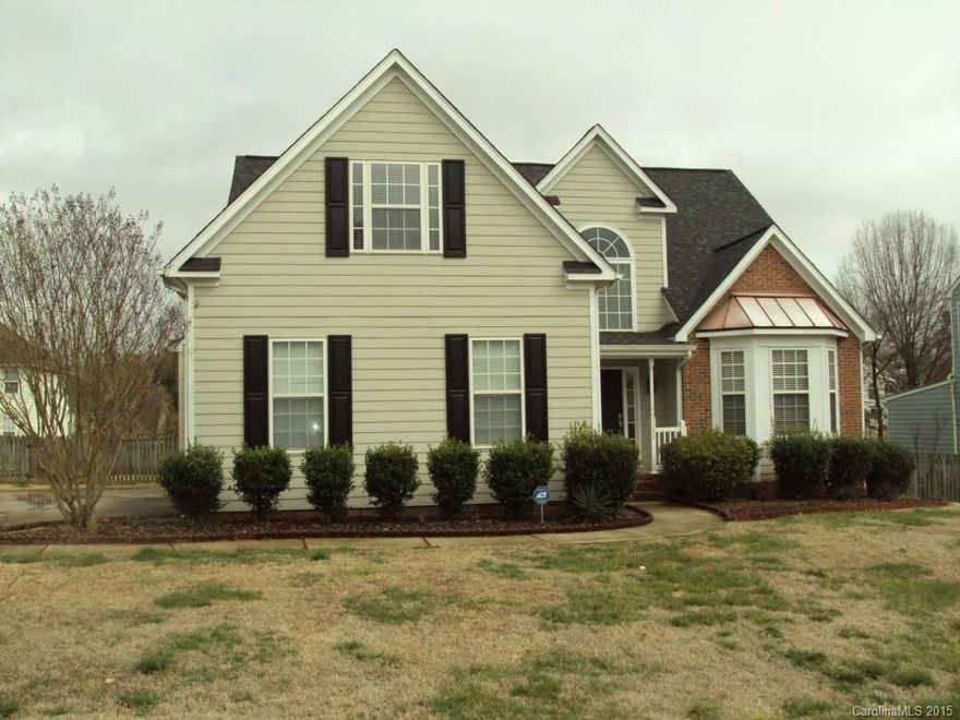 Beautiful Traditional home with open spaces, granite counter tops, beautiful hardwood floors.  Huge sun/family room addition.  Upgrades include ceramic tile, soaring ceilings, open floor plan.  Huge 400 square foot deck for entertaining, large additional parking pad, concrete board siding.  bring your buyers, they will not be disappointed when they see this home.