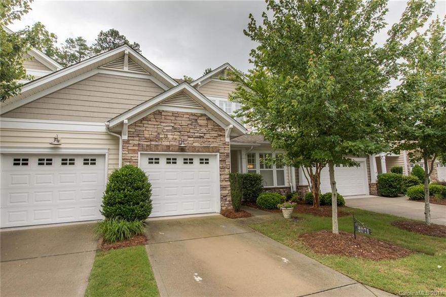 Remarkable, well-maintained 2 story townhome in beautiful Calloway Village. This spacious home features 3 bedrooms; 3.5 bathrooms; updated kitchen with granite; stainless steel appliances, solid surface counter-tops, and peninsula; large first floor master with 5 piece bath and walk-in closet; two story great room with fireplace which leads to private patio; huge loft for rec/playroom (easily converted to 4th bedroom; trey ceiling; hardwood flooring; and an attached one car garage.