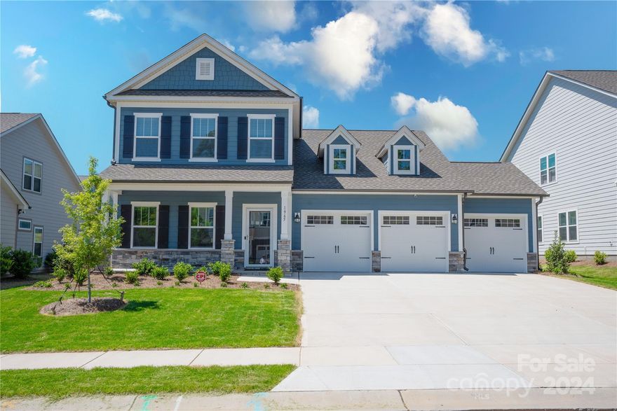 Discover this stunning new construction 4-bedroom, 2.5-bath property located in the gated community of Handsmill on Lake Wylie. Open floor plan boasts 10-foot ceilings and tons of added features. The spacious kitchen features an oversized island with elegant quartz countertops, upgraded cabinets, and beautiful crown molding. The family room is bright and airy, thanks to large bi-parting doors that fill the space with natural light. Step outside to the covered, screened patio-wired for TV-ideal for entertaining or enjoying your morning coffee. The extended outdoor area includes an epoxied large patio, and a gas line hookup, perfect for a grill or firepit. Upstairs, you’ll find two generously sized bedrooms, a study with French doors and custom built-ins, and a spacious 4th bedroom or bonus room. The 3-car insulated garage features epoxied flooring belt drive garage door openers and is wired for two EV chargers. Listing agent is related to seller. Seller is also a co-listing agent.