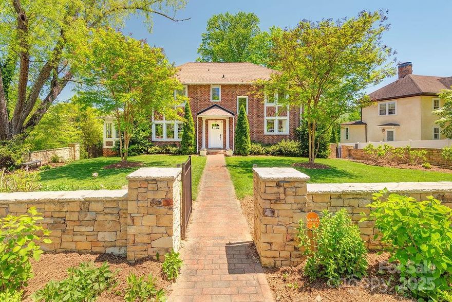 Immaculate traditional brick home w/ a contemporary flair in desirable Lakeview Park! Stone walls enhance the exquisite curb appeal of this stunning 1928 home. Historic charm w/ modern conveniences, this beautifully updated home offers elegant flow for everyday living & entertaining. This light-filled home boasts hrdwd flrs, 9' ceilings, curved entryways, fireplace, built-ins, dreamy sunroom, gourmet kitchen w/ brkfast nook. Primary ensuite offers tiled shower, soaking tub, dbl vanity & walk-in closet. Spacious & sunny yard w/ mature trees & landscaping for room to garden & play. Soak up the sun on your private expansive deck while taking in the mountain views. Daylight basement w/inside & outside entry is perfect for guest or au pair w/ family rm, bdrm/bonus & full bath (some ceilings 6’10”). 1-car garage in basement w/ add. storage room. Incredible N. AVL location! Only mins to Beaver Lake for trails, boating & birding, The Country Club of Asheville & all North AVL shopping & dining.