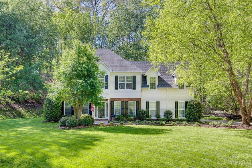 Beautiful home nestled on a spacious .93 lot features a sprawling lush green lawn, many mature and flowering trees and serene private backyard.  This meticulously maintained home boasts newer LVP flooring throughout the main level, walls of windows bringing the outdoors in, granite counters and SS appliances in the kitchen and a large GR with cozy gas FP.  Primary bedroom is bright & airy with a spa bathroom, double sinks, jetted soaking tub and closet with built in's.  Bright ,sunny secondary bedrooms share a jack-n-jill bathroom and a large spacious bonus room complete the upstairs.  Tara Plantation is conveniently located to shopping, I77, restaurants & schools yet is a quiet oasis of beautiful homes on large treed lots.  Seller is providing an Old Republic Home Warranty for the buyer.