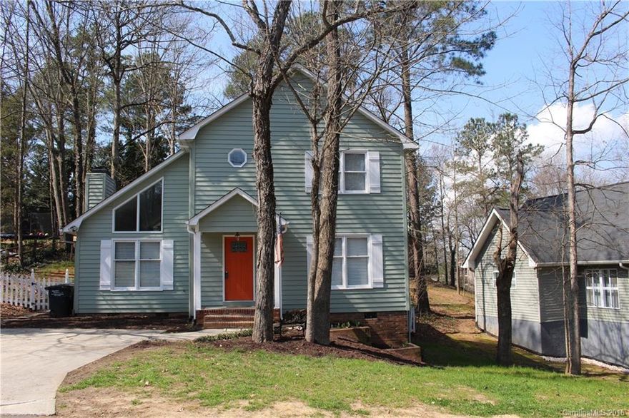 Back on the market! Contingency expired. A beautiful home in the heart of Tega Cay. Located on quiet street with no thru traffic. This lovely home features an updated kitchen, new granite and backsplash. Features includes large master on ground floor with walk in shower. Beautiful laminates on lower level, open concept from kitchen to living room. New carpet on stairs and in both upstairs bedrooms that share a jack and jill bath. Screened porch and large deck, features a one of a kind workshop.