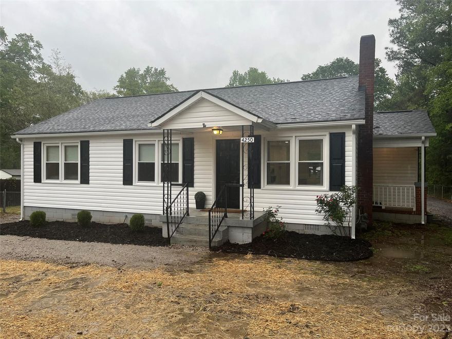 Lovely updated home sitting on over 6 acres. Beautiful Finishes! Seller recently added a large metal shop with three garage bays and electricity.