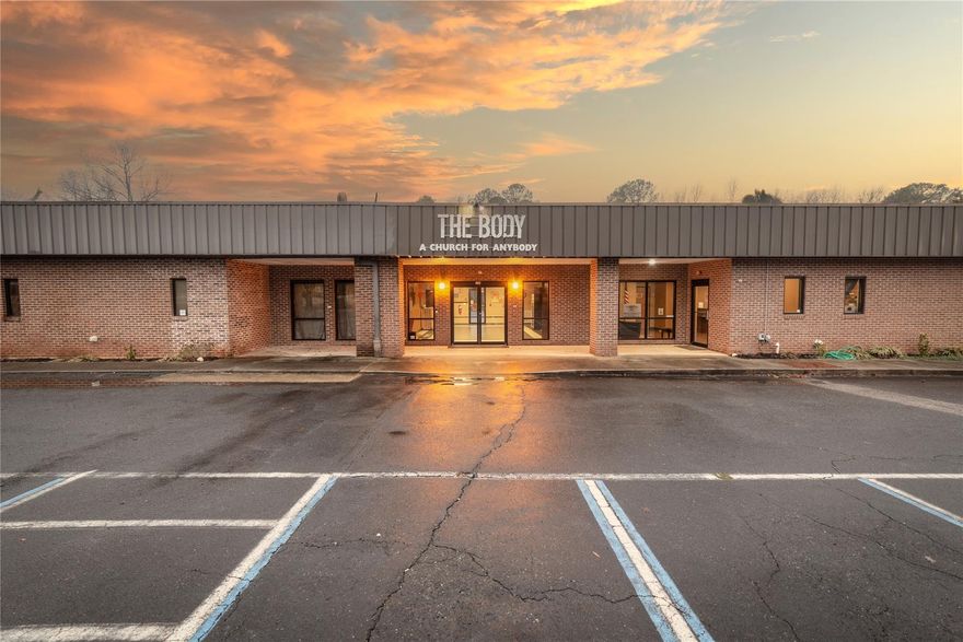 Ready to move in, commercial property located approximately 3 miles from central business district of Rock Hill, SC, easy access to I-77, close to Rock Hill Airport and close to Piedmont Medical Hospital.  No current tax records, owned by 501C3. Could be used for: medical, office, industrial, church, daycare, shared workspace, school or event space. Building originally constructed in 1988 with additions in 1993 and 1996. Total of 80 parking spaces, includes handicap. Wide open area can be used as a warehouse, office workspaces or event center. Some special features of the property include a coffee shop, large, beautiful kitchen (remodeled in 2016) 2 large open entrances allow separating spaces, handicapped bathrooms, sound booth or nurses station, small, fenced area in back of building, great for an employee area, or playground and wooded lot. Agent to verify city restrictions for zoning. Great building, great property size and great location. Listing Agent is related to Pastor.